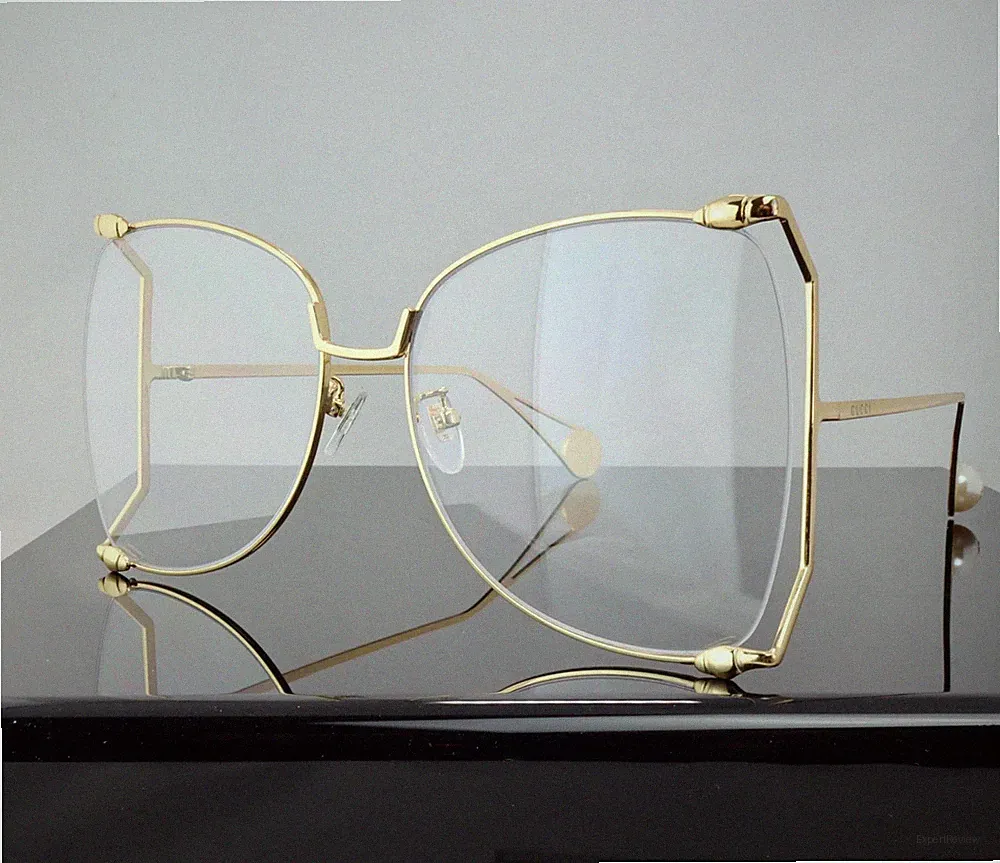 Gucci GG0252S Gold / Clear Lens Butterfly Oversized Women Sunglasses 100% UV
